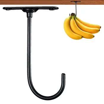 Bananų kabliukas po spintele Bananų kabliukas po spintele Metalinis sulankstomas bananų kabliukas lengviems virtuvės daiktams su lipniais